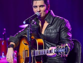 Emilio Santoro as Elvis